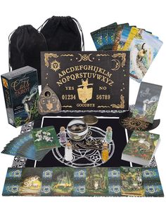 an assortment of tarot cards and other items