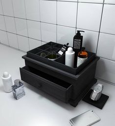 a bathroom sink with soap, toothbrushes and other items on the counter top