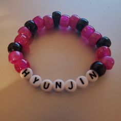 handmade kandi bracelet for stray kids hyunjin ! please message us with any questions or concerns. Kpop Pink Beaded Bracelets, Pink Kpop Beaded Bracelets, Pink Beaded Kpop Bracelets, Kpop Handmade Bracelets For Friendship, Kpop Handmade Friendship Bracelets, Handmade Kpop Friendship Bracelet, Handmade Black Kpop Beaded Bracelets, Adjustable Handmade Kpop Wristband, Handmade Black Beaded Kpop Bracelet