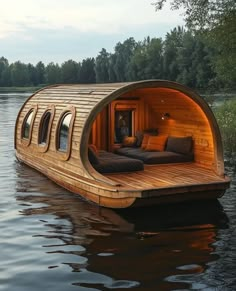 a wooden boat floating on top of a body of water