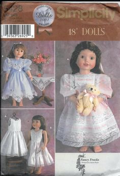 the doll is wearing a white dress and holding a teddy bear