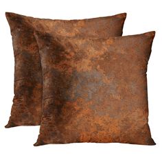 two brown pillows sitting next to each other