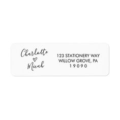 a white address label with the words charlotte and michael written in cursive ink