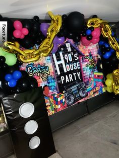 balloon decorations and balloons are on display at a house party