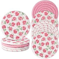 pink and white coasters with roses on them