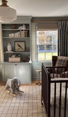 a baby crib in the middle of a room