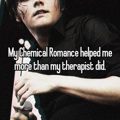 a man holding a microphone with the words my chemical romance helped me more than my therapist did