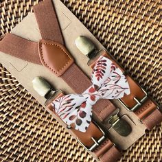 This burnt orange floral bow tie & brown suspenders set is a great choice for a bowtie for a terracotta wedding, fall wedding, autumn ring bearer gift, boho wedding, bow ties for men, ring bearer outfit, any other special occasion. ❤ **Please Specify**  Bow Tie Only (w/ Clip or Neck Strap), Suspenders Only, or Bow Tie Only & Susp (Bow Tie and Suspenders) SUSPENDERS- One Pair of our Quality Suspenders BOW TIE - One Bow Tie on White Adjustable STRAP or Alligator CLIP PET BOWTIE w/ Elastic Loops- S Orange Ring Bearer, Elegant Brown Belts And Suspenders For Wedding, Dapper Brown Bow Tie For Wedding, Adjustable Brown Belts And Suspenders With Bow, Fall Wedding Ring Bearer, Terracotta Bow Tie, Autumn Boho Wedding, Fall Wedding Ring, Wedding Ring Bearer Outfit