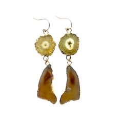 "The Catori earrings are an indulgent pairing of golden yellow solar quartz and honey-hued agate stones. The perfect pair for any autumn indulgence, these earrings are sure to bring an air of sophistication and warmth to any ensemble. 3 1/4\" Long 14k Gold-filled Earring Hooks" Yellow Agate, Yellow Earrings, Dark Yellow, Earrings Long, Quartz Earrings, Earrings Statement, Earring Hooks, Golden Yellow, Agate Stone