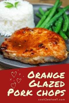 orange glazed pork chops on a plate with rice and green beans