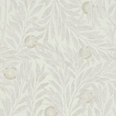 an image of a wallpaper with leaves and flowers on the back drop in white