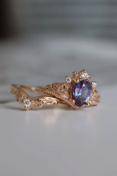 Elvish ring set with color changing alexandrite / Ariadne | Eden Garden Jewelry™ Diamond And Alexandrite Engagement Ring, Corundum Engagement Ring, Alexandrite Engagement Ring Vintage, Elvish Rings Engagement, Tangled Engagement Ring, Non Traditional Engagement Rings Gold, Non Traditional Engagement Ring, Fun Engagement Rings, Colorful Wedding Rings