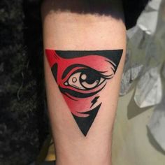 a red and black triangle with an eye on it's side, tattoo style