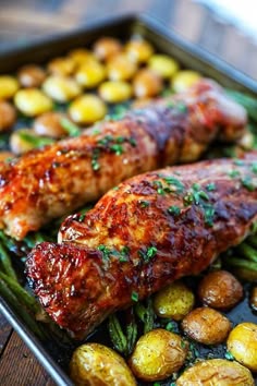 This Pork Tenderloin Recipe is a flavor packed easy sheet pan dinner. Tender green beans, crispy roasted potatoes and delicious glazed pork tenderloin all cooked simply on one sheet pan.
