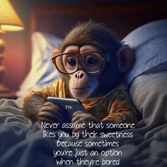 a monkey with glasses on laying in bed looking at a cell phone that says never assume that someone likes you by their sweetness because sometimes you're