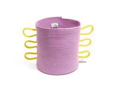 a purple and yellow rope storage container with two handles on each side, in front of a white background