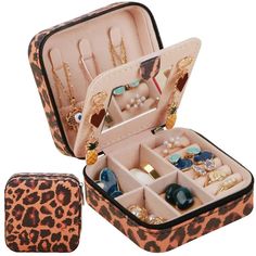 an open leopard print case with jewelry inside