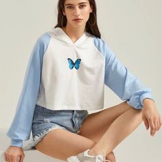 Baby Blue And White Butterfly Cropped Hoodie! New In Bag! Trendy Blue Tops With Drawstring Hood, White Hooded Sweatshirt For Spring, Trendy Blue Top With Drawstring Hood, White Hooded Spring Sweatshirt, Spring White Hooded Sweatshirt, Trendy Blue Hoodie For Fall, Light Blue Sweatshirt For Spring Streetwear, Cute Blue Hoodie Top, Trendy Blue Hoodie Sweatshirt