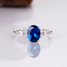 a blue ring sitting on top of a table