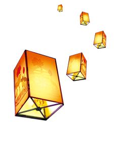 four square lamps hanging in the air with one light turned on and three lit up