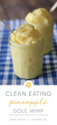 two small jars filled with food sitting on top of a blue and white checkered table cloth