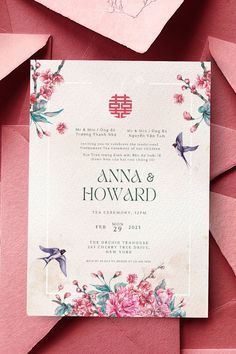 the wedding card is surrounded by pink flowers and paper cut outs, as well as envelopes