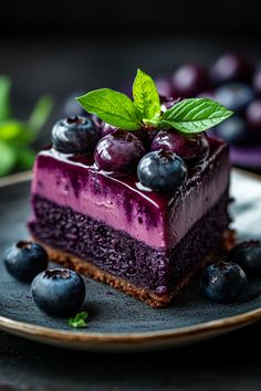 Blueberry cheesecake topped with fresh blueberries and a mint leaf on a dark plate. Blueberry Dessert Ideas, Blueberry Chocolate Cake, Lemon Blueberry Bars, Blueberry Recipe, Food Photography Dessert, Blueberry Salad, Blueberry Crisp, Blueberry Ice Cream, Blueberry Tart