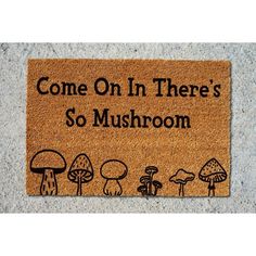 a door mat that says, come on in there's so mushroom