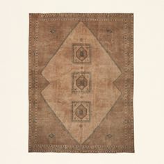 an old rug with three squares and diamonds on it