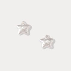 The Pearl Star Stud Earrings from our Pearl Collection are the epitome of understated elegance, perfect for refining a minimalist outfit with a touch of celestial grace. Featuring lustrous freshwater pearls set in shimmering silver, these star stud earrings radiate both simplicity and sophistication. Their delicate star shape captures a dreamy, ethereal quality, while the pearls evoke timeless beauty. Whether you’re dressing up for a formal event or elevating your everyday look, these pearl earrings add a hint of starlight that shines through in every ensemble. A versatile treasure, they will seamlessly complement your minimalist wardrobe. DETAILS Materials:   Freshwater Pearl, Silver Measurements: 0.47"*0.47" (1.2cm*1.2cm) Weight: 2.1g Star Stud Earrings, Pearl Collection, Star Earrings Stud, Minimalist Wardrobe, Pearl Set, Silver Stud Earrings, Star Studs, The Pearl, Understated Elegance