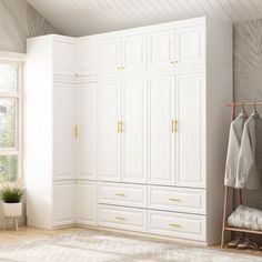 a bedroom with white closets and an open window