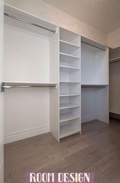 an empty closet with white walls and wooden flooring is pictured in this image, there are no doors or shelves