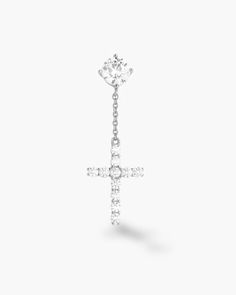 The earring everyone’s been asking for: the Hanging Cross Stud Earring. This unique men’s silver earring has a studded cross dangling from a 1ct diamond simulant stud for delicate movement and maximum style.