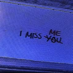 the words i miss you are written in black ink on a blue screen with an orange fire hydrant