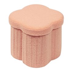 a pink stool that has been made out of foam and is sitting on a white surface