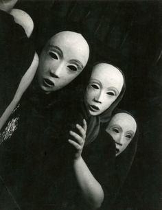 an old photo of three women with alien heads on their shoulders and one woman's face in the middle