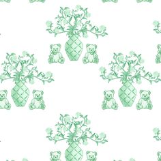 a green and white teddy bear with flowers in a vase on a tree branch fabric