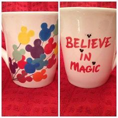 two mugs with mickey mouse designs on them and the words believe in magic painted on them