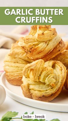 garlic butter crufffins on a white plate