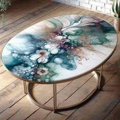 Meet our AI-generated table, a unique resin art piece. Showcasing serene blues, purples, and greens blended flowingly like a watercolor, with subtle floral hints. Framed by timeless rustic charm. #ResinArt #VintageDesign #HomeDecor #WatercolorArt #FloralResinTable #RusticHomeStyle Resin Crafts Tutorial, Flower Bird, Living Essentials Oils, Epoxy Resin Art, Acrylic Tray, Resin Table, Table Flowers