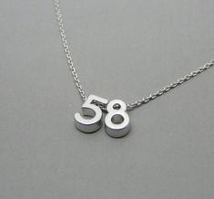 "Silver number necklace, Lucky number necklace, Number jewelry, Number charm,  Personalized jewelry, Custom jewelry Material: Charm: Rhodium plated   Chain:  Rhodium plated  Size: Charm: Approx. 6mm Chain: 16\"  Available with 15\",16\",17\",18\" chain, just leave me a note. For Gold version: https://www.etsy.com/listing/259681060/number-necklace-lucky-number-necklace All necklaces come gift packaged! Personalized notes are welcome :) Please let me know the message you would like to be included Number Jewelry, Number Necklace, Silver Numbers, Lucky Number, Personalized Notes, Plate Size, Personalized Jewelry, Rhodium Plated, Custom Jewelry