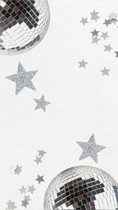 silver stars and disco balls on white paper