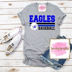 the eagles baseball shirt is next to some shoes