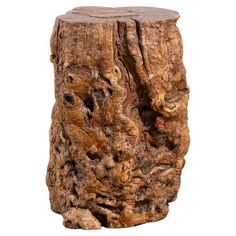 a piece of wood that looks like it has been carved to look like a tree stump