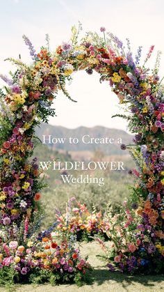 an arch made out of flowers with the words how to create a wildflower wedding