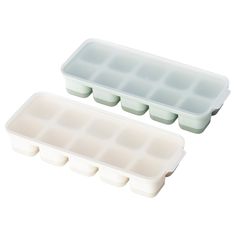 two ice trays with dividers on each side, one is empty and the other has