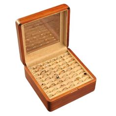 an open wooden box with several rings in it's display case and its lid opened