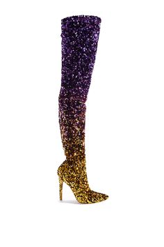 The ELLIANA-MULTI STILETTO BOOT is the epitome of sexy and sophisticated. With its thigh-high silhouette and pointed toe, these boots will make a statement wherever you go. Their purple and yellow gradient sequins shimmer with the slightest movement, drawing admiration with every step. Slip into these stilettos and bask in the confidence and sophistication that comes with wearing an ultra glamorous boot. Shaft Height: 30" Circumference: 21" Heel Height: 4.5" Thigh High Dress, Statement Boots, Sequin Design, Sandal Platform, Dress Boots, Purple Ombre, Knee Dress, Purple Rain