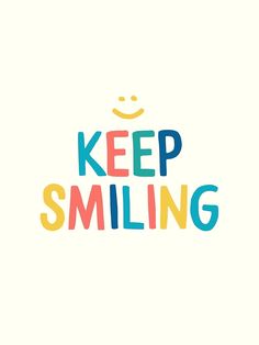 the words keep smiling are multicolored in different font styles and colors on a white background