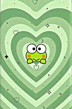 a green heart with an image of a frog in it's eyes and stars